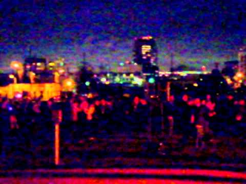 Xenakis' Persepolis in the park with torch and crowd
