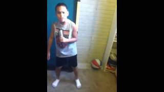 8 year old boy singing grenade by bruno mars