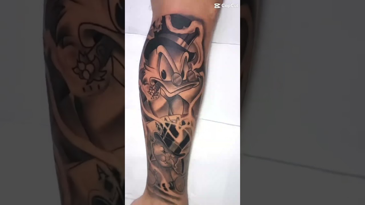 Tattoo tio patinhas na perna !
