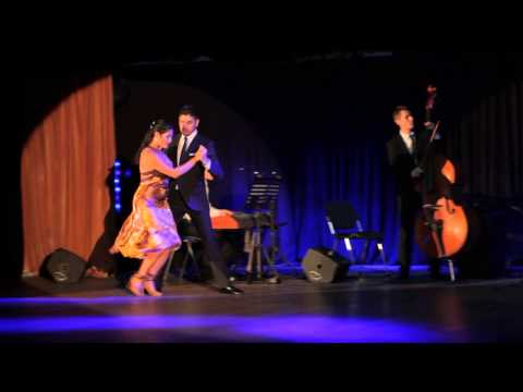  Sebastian Jimenez  and  Maria Ines Bogado  are  dancing  to  a  vals  at  White Nights tango festival  in  2014
