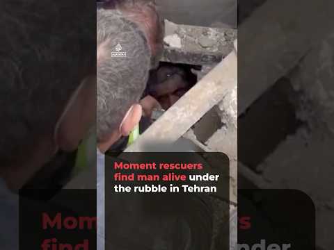 Moment rescuers find man alive under the rubble in Tehran | AJ #shorts
