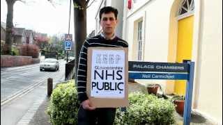 James Beecher from Stroud Against Cuts speaks outside Neil Carmichael's Office in Stroud