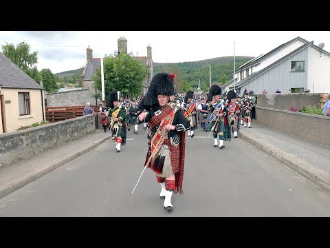 Scotland the Brave as Drum Majors lead the Massed Pipe Bands away from 2022 Dufftown Highland Games