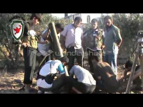 تجهيز مدفع الهاون من قبل كتيبة الشهيد عبد الرحمن العزو لدك مقرات النظام على جبهة الدار الكبيرة في ريف حمص