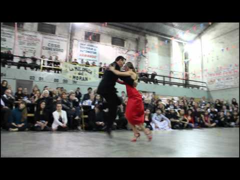  Analía Centurión  and  Gabriel Missé  are  dancing  to  the  milonga  "  Mozo Guapo  "