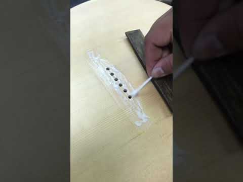 Acoustic Guitar Bridge Unorthodox Reglue.