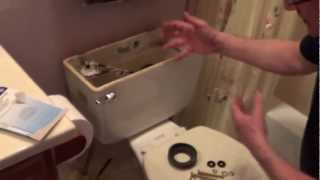 How To Fix a Leaking Toilet Tank - Toilet Tank Repair - Remove Rusted Toilet Bolts