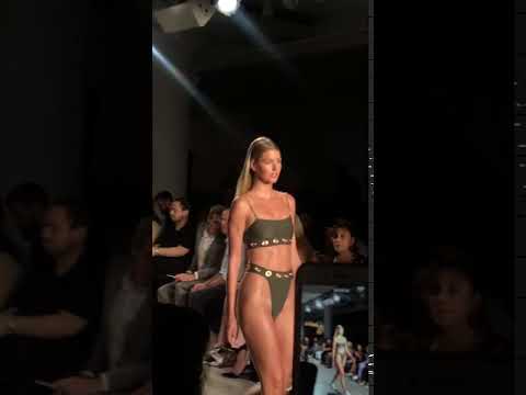 Nicole Botte's model walking the runway at Revival Swim's New York Fashion Week show.