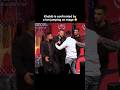 Khabib is confronted by a fan jumping on stage 😐