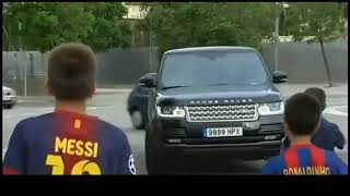 Lionel Messi stops the car and signs autographs to young fans