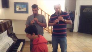 Dad, uncle and cousin play a song