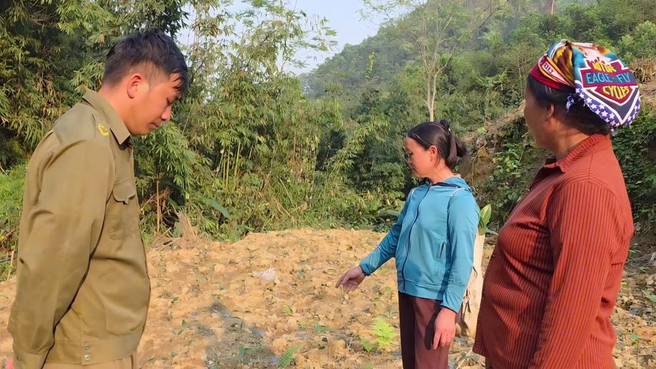 NHAT's mother was very angry because HANG's mother had encroached on her land.