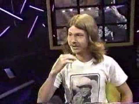 Kenneth Keith Kallenbach Blows Smoke Out of His Eyes