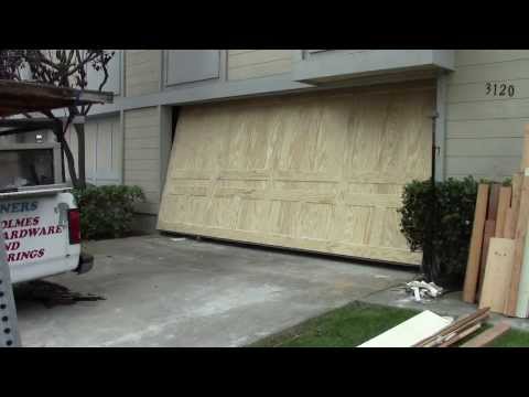 A wood one piece garage door