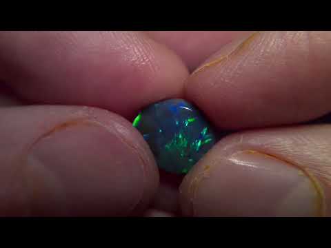 4.10cts top gem black opal with very rare cloverleaf pattern