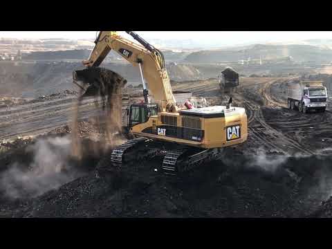 Caterpillar 385C Excavator Loading Coal On Trucks - Kivos Ate