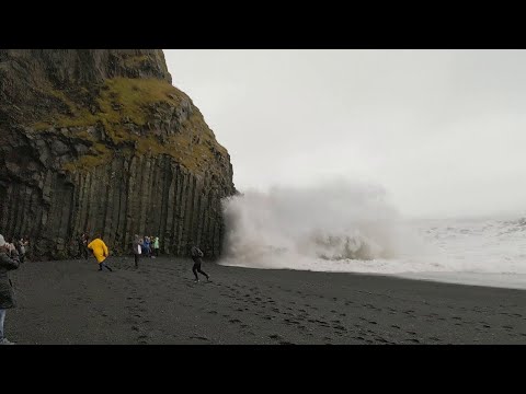 Friend on Cliff Get Crashed on by Wave || ViralHog