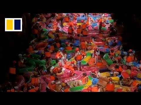 Chinese tourists stranded while rafting in valley