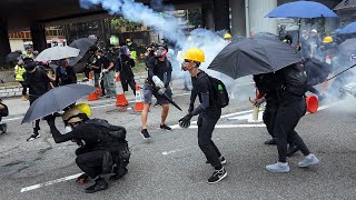 video: Hong Kong police fire water cannon and tear gas as protesters defy rally ban with petrol bombs