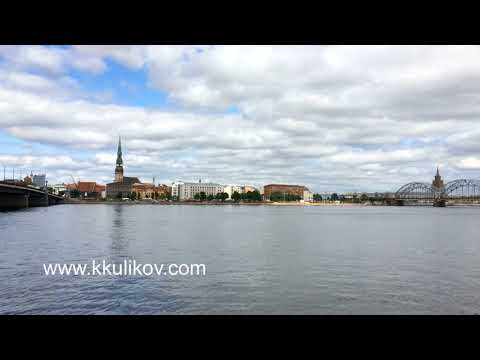 View through the Daugava River of the Riga railway bridge and the Building of Academy of Sciences of