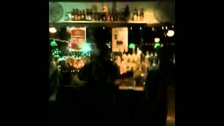 Big Sandy and his Fly-Rite Boys tend bar