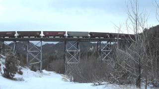 preview picture of video 'BNSF/MRL crosses Austin Creek Trestle, Mullan Pass'
