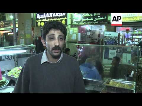 Syrians bring traditional food to Cairo after fleeing violence