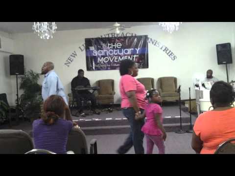 Pastor Gerald Pace and TSM praying for St. Louis