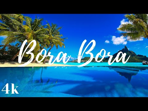 Bora Bora, French Polynesia, Flying Over Beach Resort. 4k Ultra HD