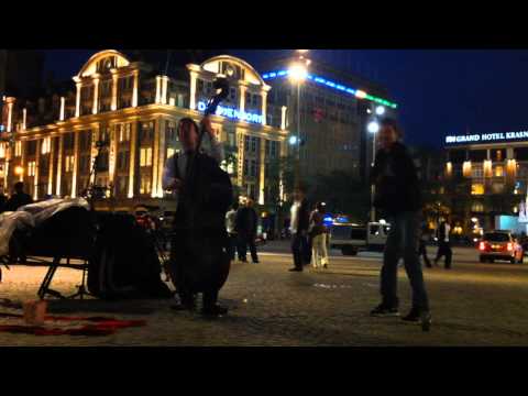 Amazing bass player and dancing guy, dam square Amsterdam