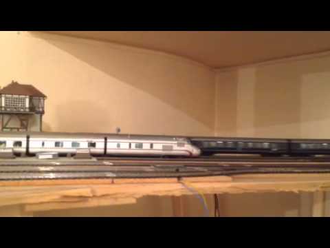 Blauer Enzian led by a V200 passing by a stationed Senator