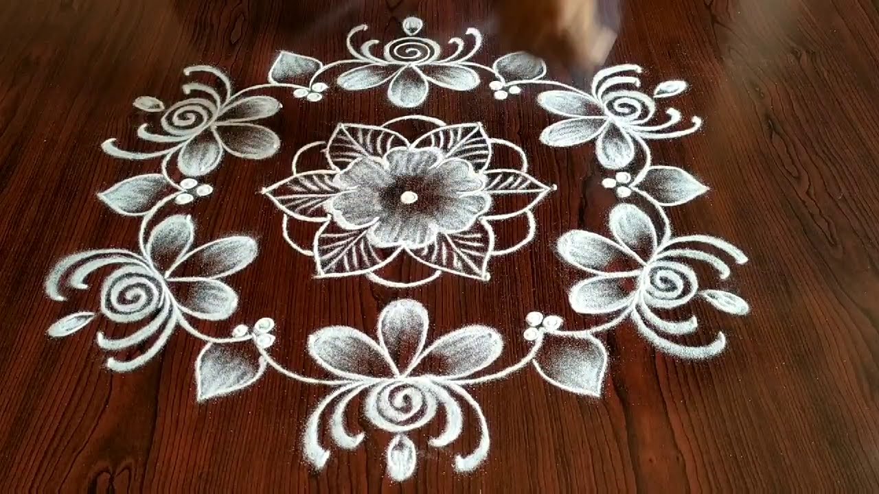 flower kolam rangoli design 7*4 dots by simple and easy rangoli