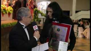 Comendador Carlos de Albuquerque subindo ao palco para premiação pela Braslider