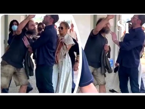 Ben Affleck protects Jennifer Lopez from overzealous fan at Venice airport