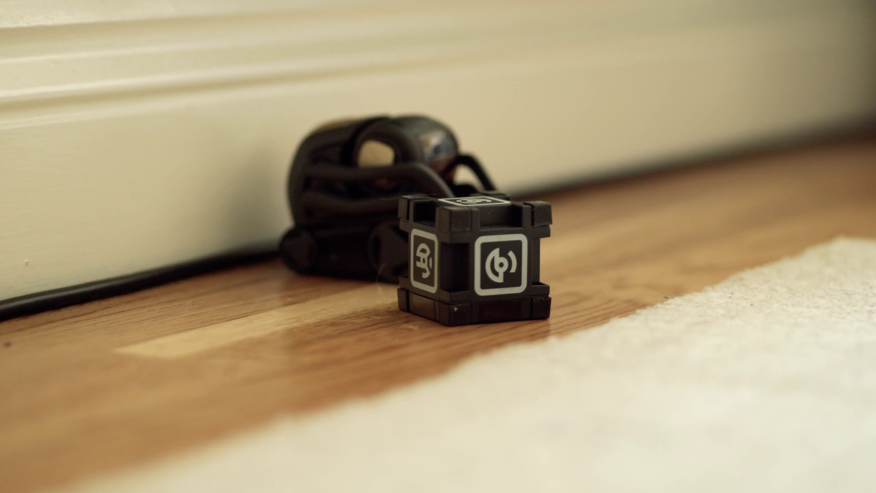 Vector the robot playing with his cube