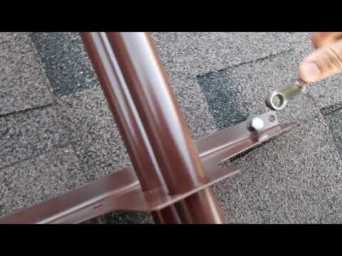 Установка снегозадержателя NewLine на крышу.