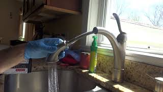 kitchen faucet leaking water into cabinet