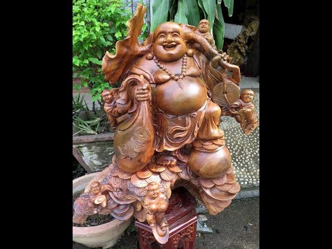 Tìm hiểu nguồn gốc Phật Di Lặc. Ý nghĩa các biểu tượng phong thủy đi cùng tượng gỗ Phật Di Lặc.