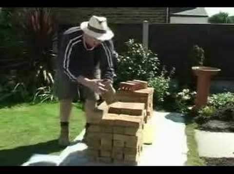 Part of a video titled Loading Out Stacking Bricks - YouTube