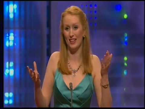 Llio Evans in Green Satin Dress