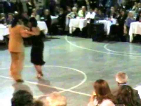  Andres Laza Moreno  and  Samantha Dispari  are  dancing  to  the  milonga  "  Milonga, Vieja Milonga  "