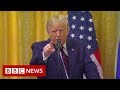 Donald Trump argues with reporter over Ukraine question - BBC News
