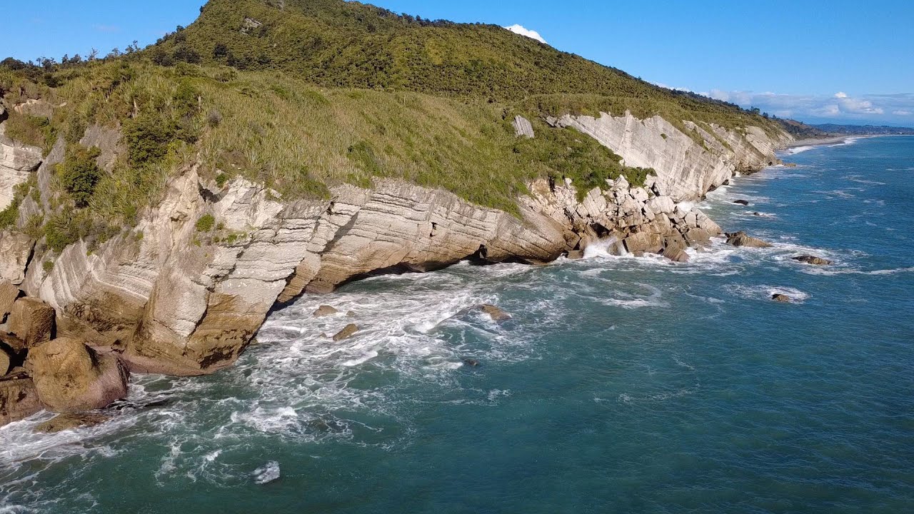 Discover the cinematic panoramic views of Rapahoe Beach