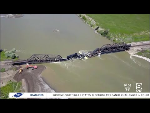 Cleanup of train derailment and bridge collapse continues