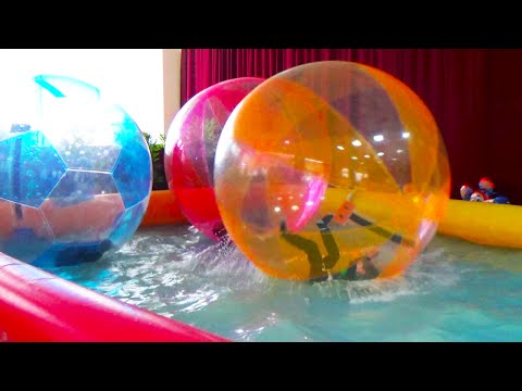 Giant WATER BALLS in a pool  - Fun activities for Kids and Toddlers
