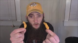 The Tongue eats two yellow ghost peppers