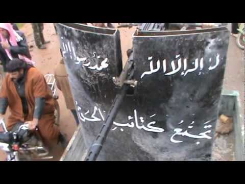 استعدادات مقاتلي كتيبة أبو عبيدة بن الجراح لبدء مجريات معركة السيطرة على حاجز السمان في محيط طيبة الإمام في ريف حماة