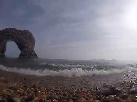 Swash on a gravel beach, Durdle Door, UK