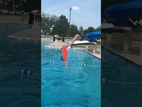 Doing a front dive pike on 1 meter ￼￼￼