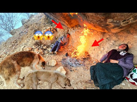 A nomadic couple searches for acorns for their sheep and gets caught in the rain.